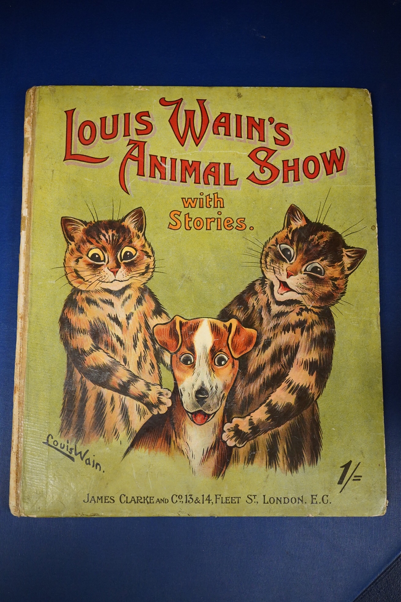 Wain, Louis - Louis Wain's Animal Show, with Stories in Prose and Verse. 1st edition, 4to, original pictorial boards, numerous black and white illustrations by Louis Wain, contemporary ink presentation inscriptions to fr